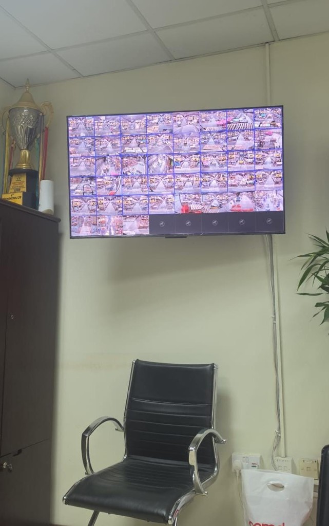 CCTV monitoring wall with multi-camera grid display for warehouse security in Kuwait